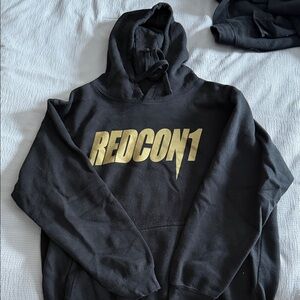 REDCON1 Black Hoodie with Gold Logo Coach Prime Edition Barry Sanders